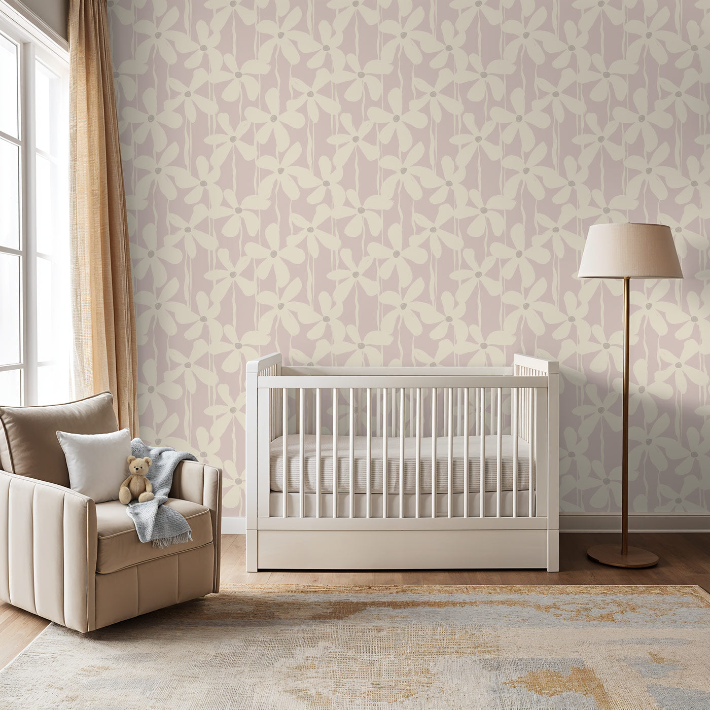 A modern floral wallpaper created with bold brushstrokes and inky lines makes a dreamy accent wall in a cozy nursery.